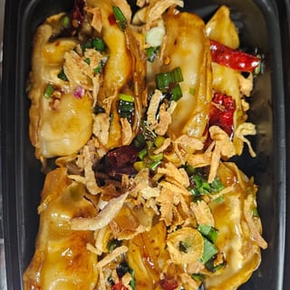 11B. "New" Szechuan Chicken Pot Stickers (12) (Hot & Spicy)
